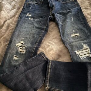Stylish Distressed Skinny Jeans in Classic Blue with glitz in rips